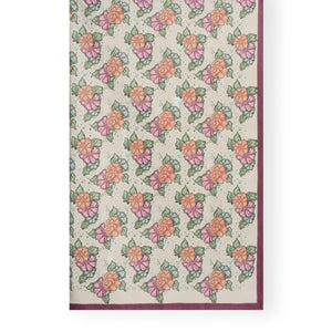 Floral table cloth with red hem
