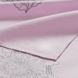 Pink table cloth with green pattern