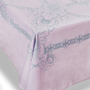 Pink table cloth with green pattern - on table