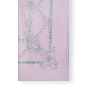 Pink table cloth with green pattern - close up