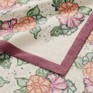 Floral table cloth with red hem